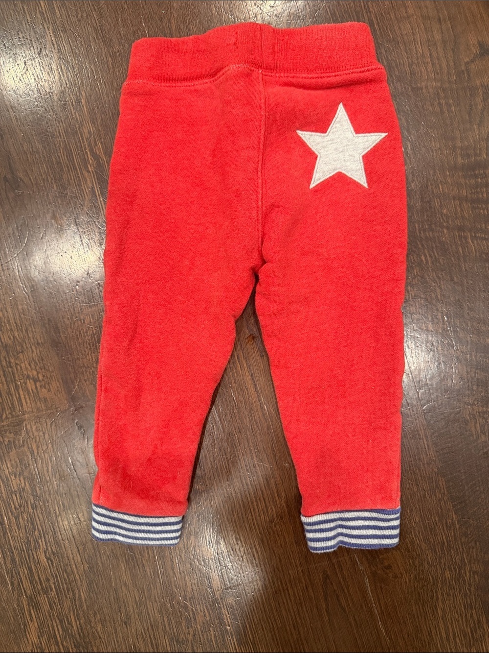 Baby Boden Red Jogger Pants with Blue Striped Cuffs and Star Detail on Backside - Picture 4 of 7